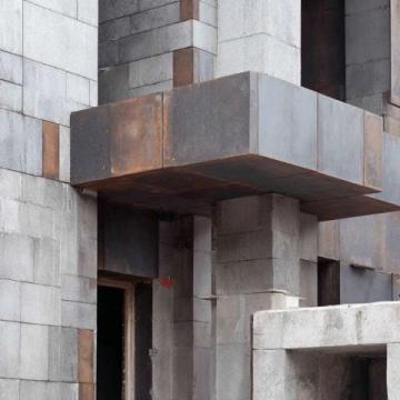墻固就是指水泥、混凝土等建筑材料固化后的硬性物質。